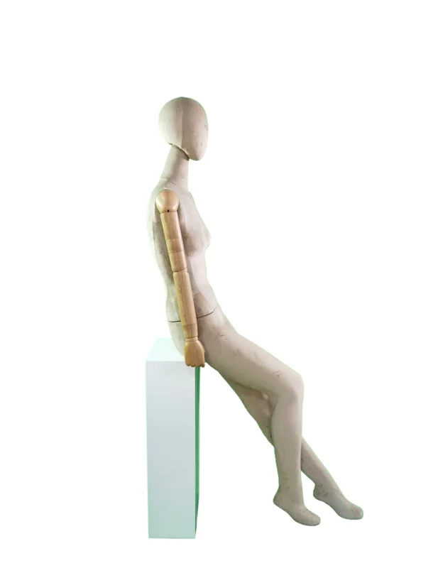 xintu-fabric-seated-female-04-side.webp Beige Fabric Female Seated Mannequin with Wooden Arms, side view